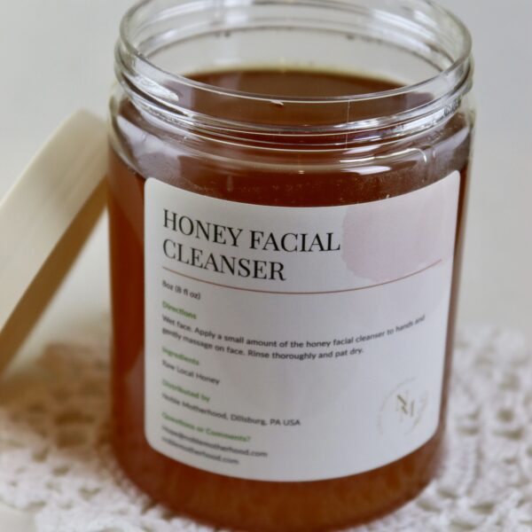 honey facial cleanser with open lid showing natural, locally sourced honey