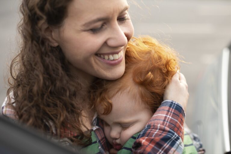 Mother embracing her young child at home — preparing for postpartum with a realistic care plan